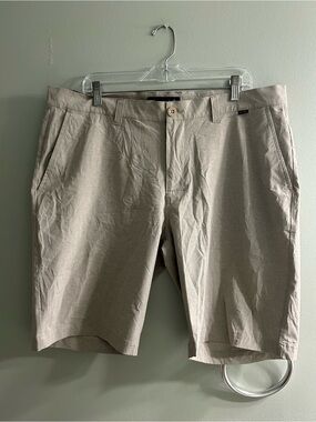 Travis Matthew gold shorts beige